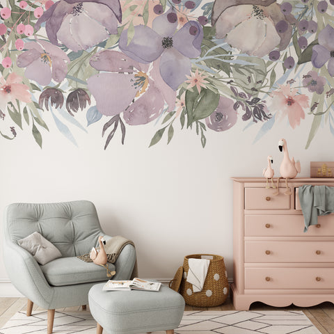 Wild Spring Garden Border 01 pink and lavender floral wall decal above a gray nursery chair and pink dresser