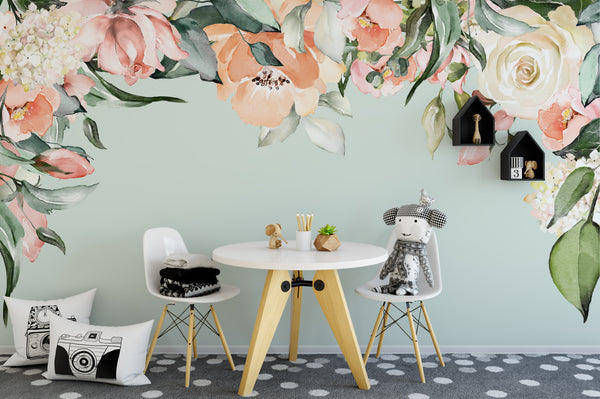 Ashley watercolor floral canopy wall decal in a nursery with a table and chairs