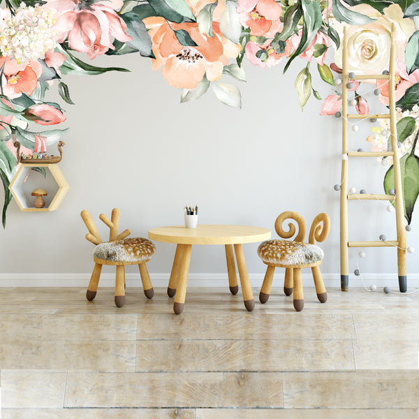 Ashley watercolor floral canopy wall decal in a nursery with a table and chairs