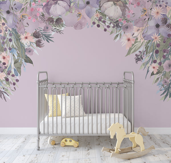 Spring Wild Garden pink and lavender floral canopy wall decal framing a lavender nursery wall above a white crib