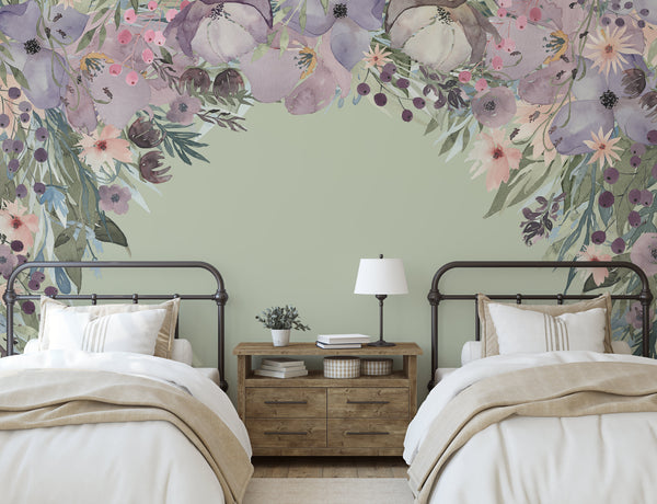 Watercolor floral canopy wall decal decorating a sage green bedroom with two beds