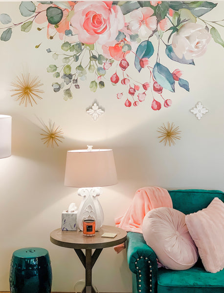 GAIA pink and cream floral decal above a chair and side table