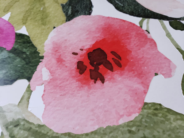 Close-up of a soft coral pink flower in the floral wall decal