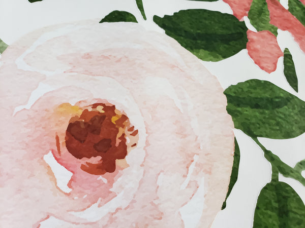Close-up of an ivory flower and green leaves in Jessica’s Farmhouse